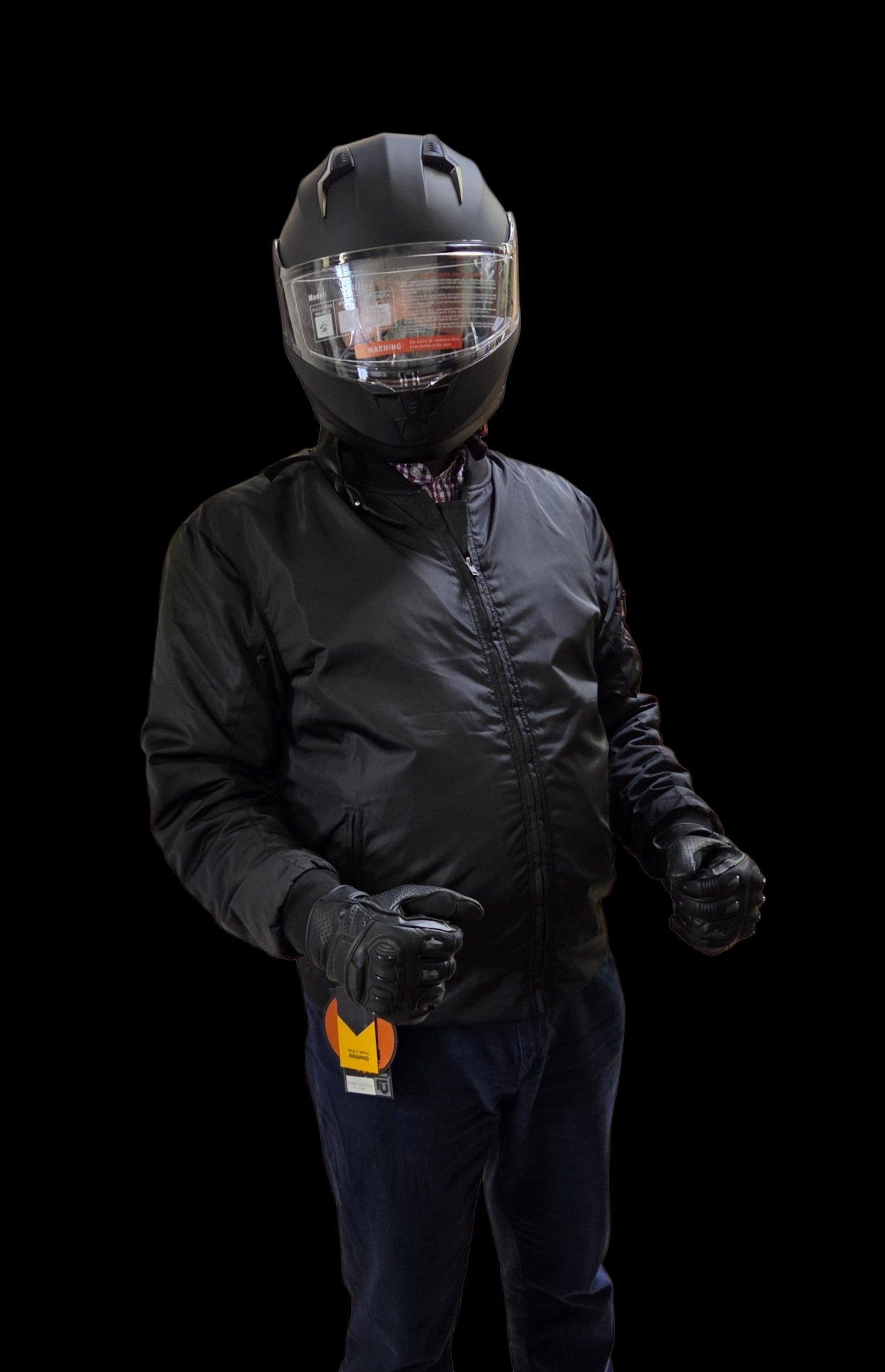 Matt black helmet on motorcycle gear